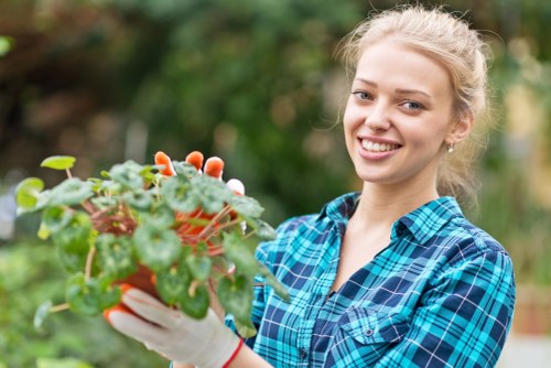 Front view of a gardener at work in a Wood Green garden